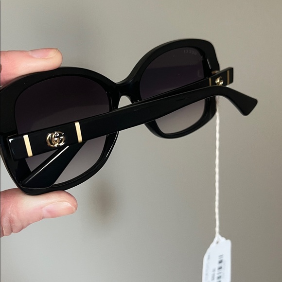 Gucci Women's Black Sunglasses with Gold Accents - Picture 9 of 10